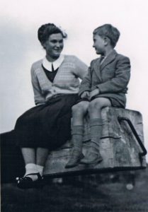 Genia Sokolowska with a local boy on a lock arm