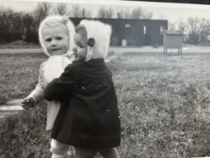 Krystyna and Irena playing with Site 3 washblock behind
