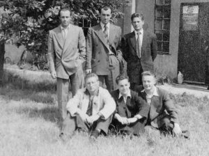 Ted (bottom right) with a group of friends.
