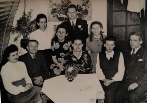 The Buczak family in their Nissen hut at Marsworth camp. L to R, my aunt Jasia (Buczak). Granddad Szczepan, Stefania, Zosia, grandmother Katarzyna Buczak (centre, sitting), Rozalia Dziadura, Eugenia, Kazimierz. Uncle Edward Buczak standing at the back.